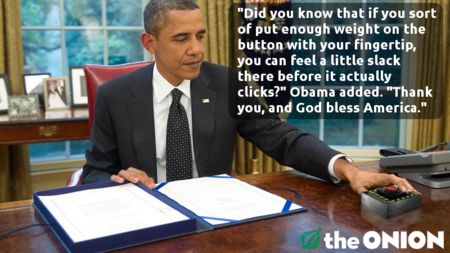 Obama with the proverbial button on his desk